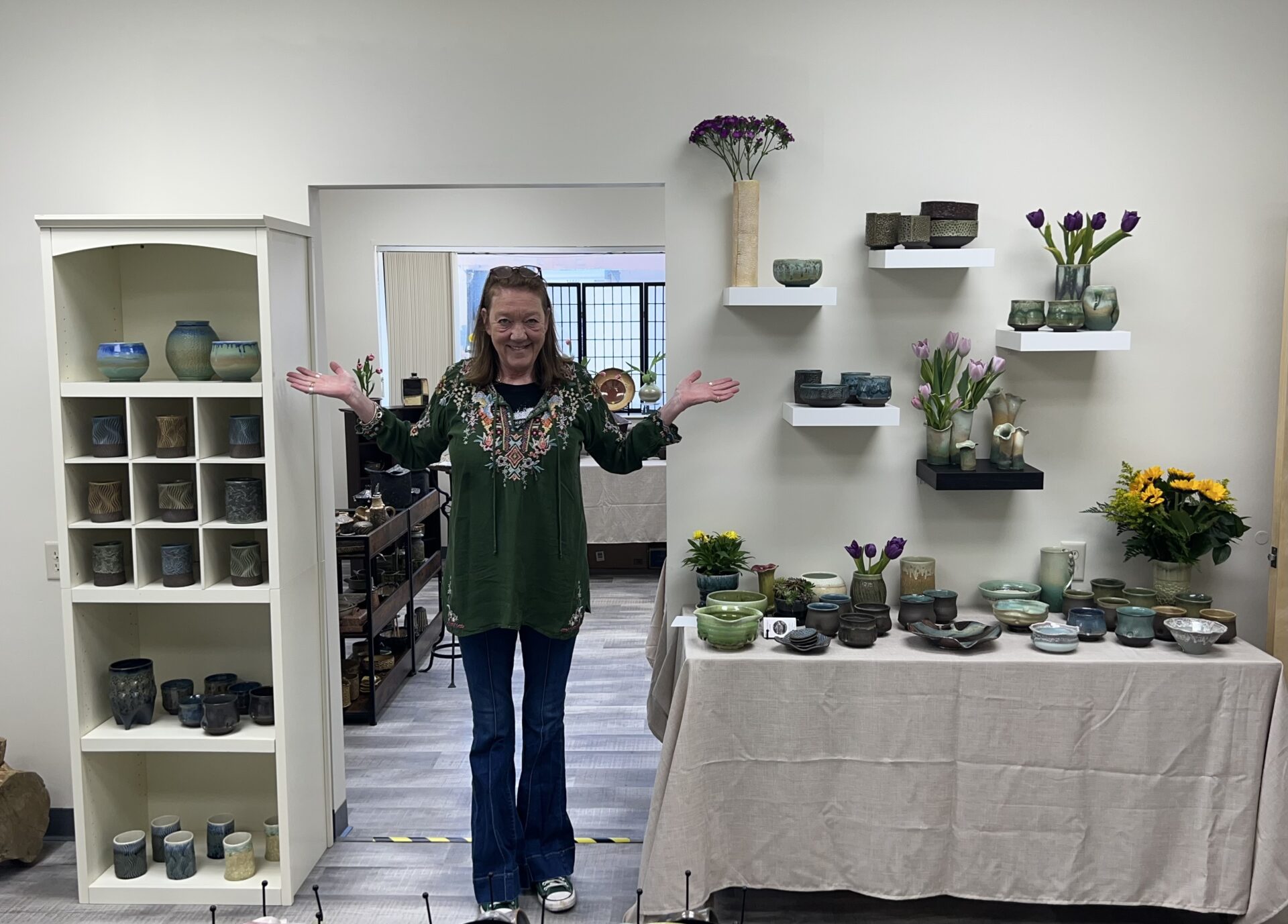 woman with Ceramics products on table